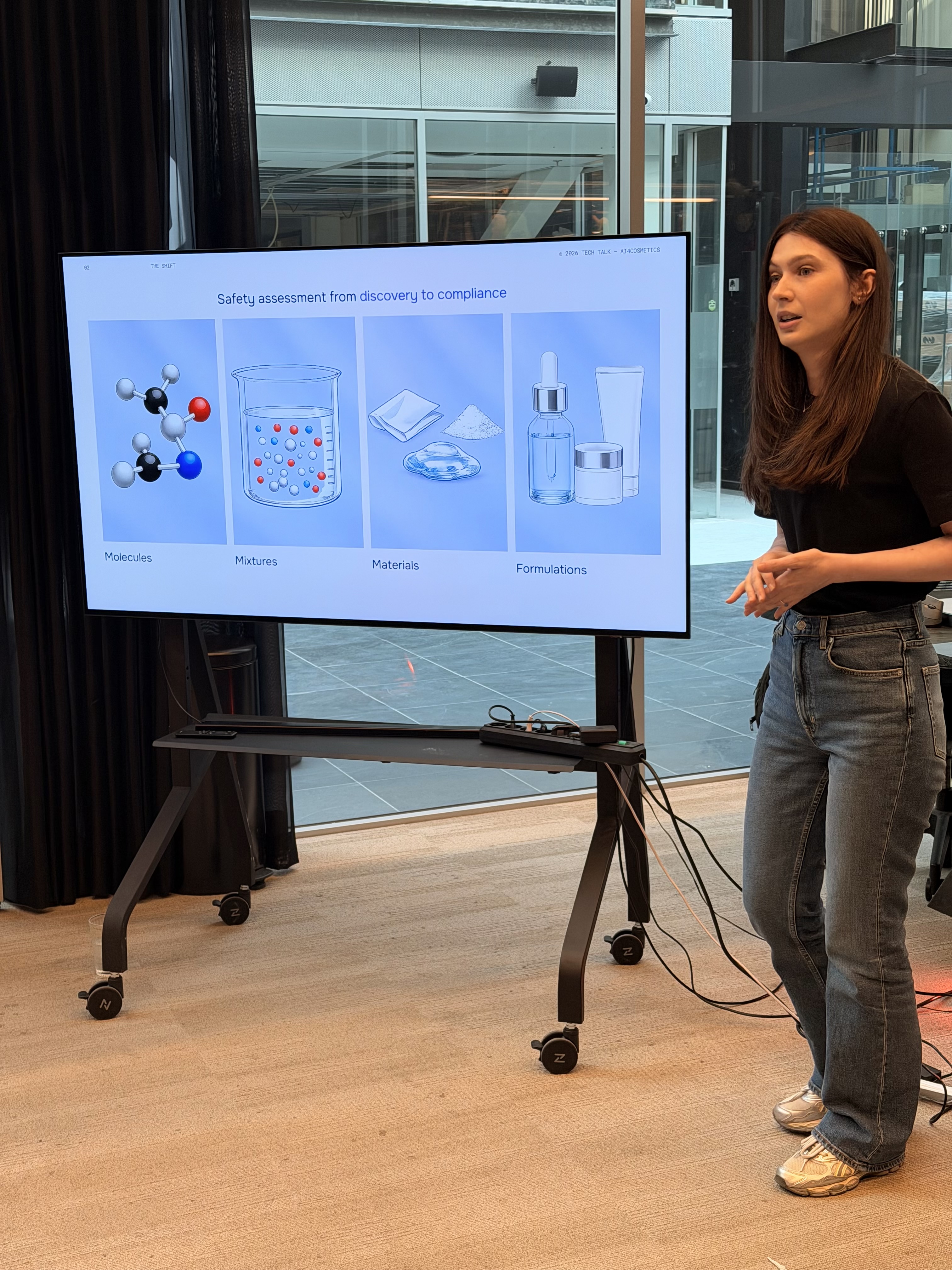 Dr Nicoleta Spînu presenting AI4Cosmetics at a tech event